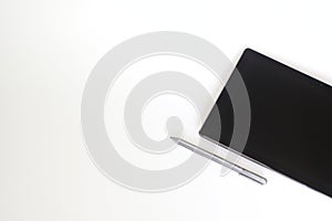 TabletÃ¢â¬â¹ withÃ¢â¬â¹ stylus penÃ¢â¬â¹ isolatedÃ¢â¬â¹ onÃ¢â¬â¹ whiteÃ¢â¬â¹ background. photo